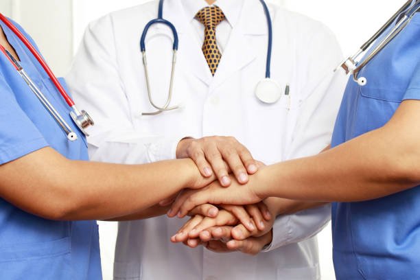 Medical Tourism in Syria 2026 concept teamwork doctor and nurses coordinate hands for success work